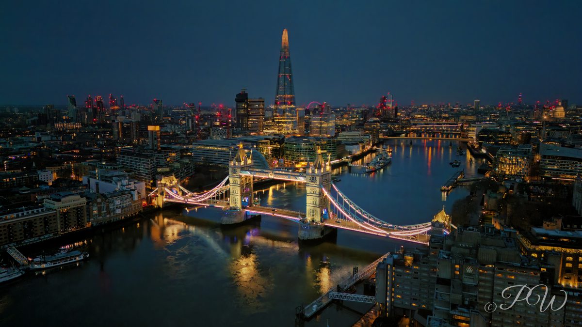 Tower Bridge and The Shard at night, aerial view, London
